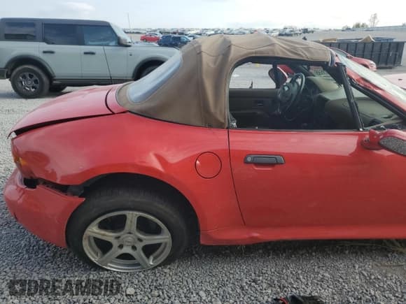 ✅ 1999 BMW Z3 2.5 • VIN: 4USCH9335XLG01068 • Lot: 71503555. Listed on Copart with 112,447 mi. Free auction sales archive from the USA and detailed vehicle history report at DreamBid. Image 10.