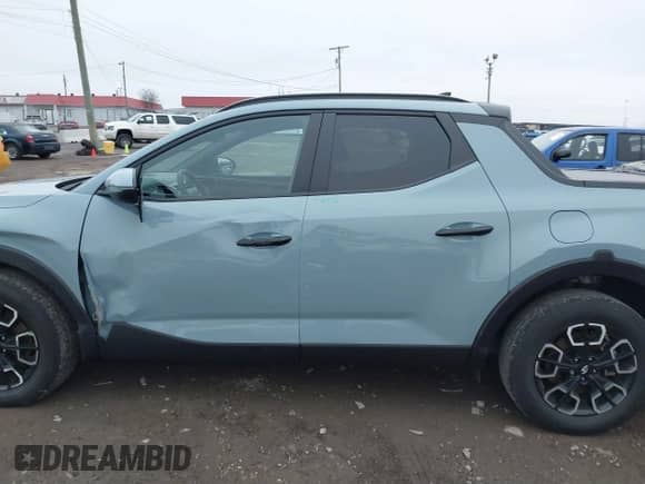 2023 Hyundai Santa Cruz SEL z VIN 5NTJCDAE7PH071384, wystawiony jako IAAI lot #41284372 z przebiegiem 29 160 mil mil oraz . Historia ofert i sprzedaży dostępna na DreamBid. Obrazek 14.