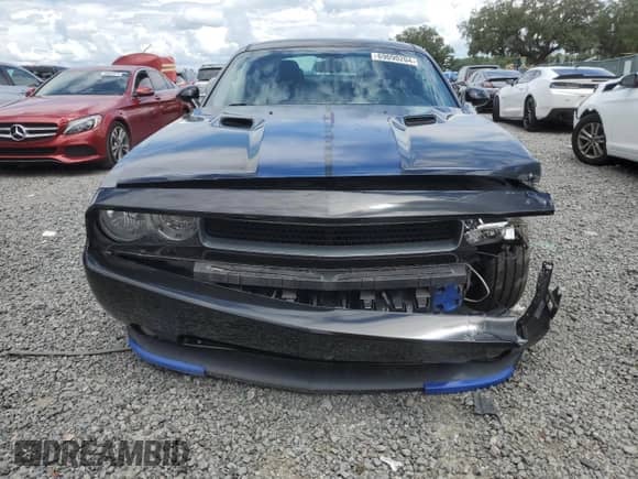 2013 Dodge Challenger SXT z VIN 2C3CDYAG5DH569623, wystawiony jako Copart lot #69090204 z przebiegiem 178 646 mil mil oraz Szkoda całkowita • Salvage title. Historia ofert i sprzedaży dostępna na DreamBid. Obrazek 5.