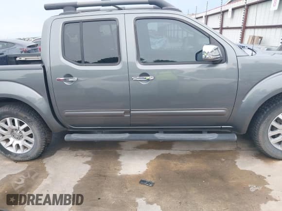 ✅ 2009 Nissan Frontier SE • VIN: 1N6AD07U09C418200 • Lot: 42475179. Wystawiony na IAAI z przebiegiem 55 980 mil. Bezpłatny archiwum sprzedaży aukcyjnych z USA i szczegółowy raport historii pojazdu na DreamBid. Zdjęcie 13.