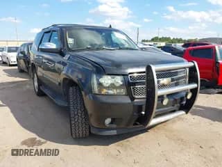 2007 Chevrolet Tahoe LT z VIN 1GNFC13J47R409143, wystawiony jako IAAI lot #43302304 z przebiegiem 218 673 mil mil oraz . Historia ofert i sprzedaży dostępna na DreamBid. Obrazek 1.