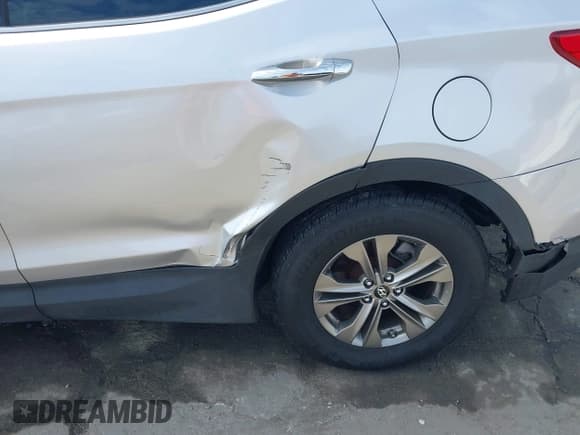 ✅ 2014 Hyundai Santa Fe • VIN: 5XYZU3LB7EG205102 • Lot: 43657537. Wystawiony na IAAI z przebiegiem 142 689 mil. Bezpłatny archiwum sprzedaży aukcyjnych z USA i szczegółowy raport historii pojazdu na DreamBid. Zdjęcie 13.