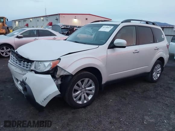 ✅ 2013 Subaru Forester X Premium • VIN: JF2SHADC2DH440452 • Lot: 43740829. Listed on IAAI with 89,774 mi. Free auction sales archive from the USA and detailed vehicle history report at DreamBid. Image 2.