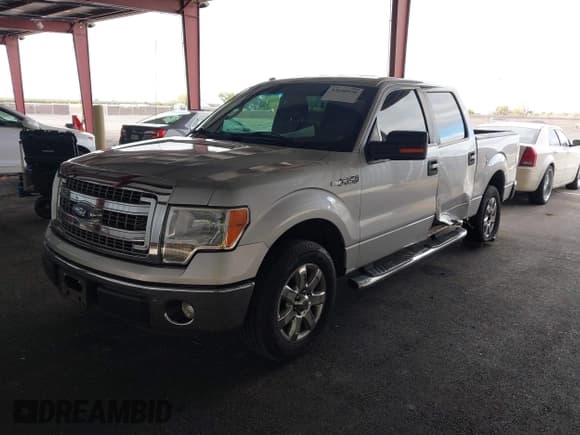 ✅ 2014 Ford F-150 XLT • VIN: 1FTFW1CF7EKD92338 • Lot: 43640970. Listed on IAAI with 140,523 mi. Free auction sales archive from the USA and detailed vehicle history report at DreamBid. Image 18.