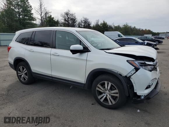 ✅ 2017 Honda Pilot EX-L • VIN: 5FNYF6H68HB075734 • Lot: 71950575. Listed on Copart with 80,157 mi. Free auction sales archive from the USA and detailed vehicle history report at DreamBid. Image 4.