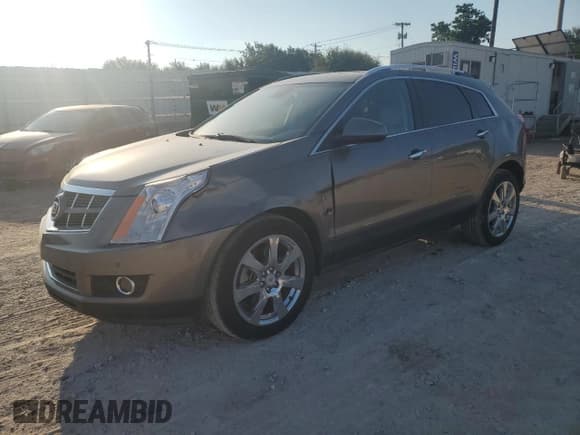 ✅ 2012 Cadillac SRX Premium Collection • VIN: 3GYFNCE31CS504130 • Lot: 80638885. Listed on Copart with 134,445 mi. Free auction sales archive from the USA and detailed vehicle history report at DreamBid. Image 1.