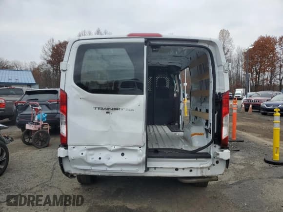 ✅ 2024 Ford Transit Cargo • VIN: 1FTBR1Y84RKA87353 • Lot: 91942245. Listed on Copart with Not provided. Free auction sales archive from the USA and detailed vehicle history report at DreamBid. Image 6.