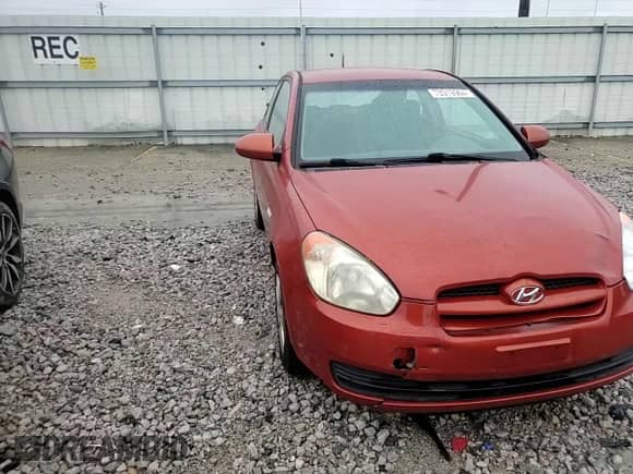 2007 Hyundai Accent GS z VIN KMHCM36C17U032099, wystawiony jako Copart lot #73319964 z przebiegiem 341 502 mil mil oraz Szkoda całkowita • Salvage title. Historia ofert i sprzedaży dostępna na DreamBid. Obrazek 11.