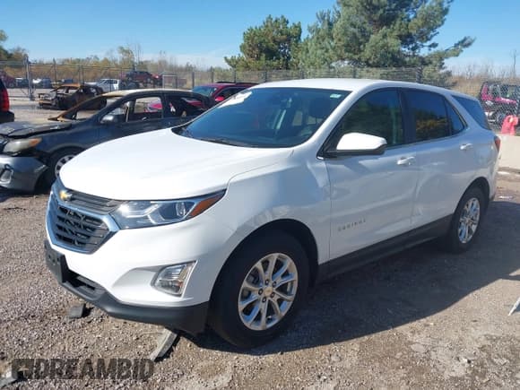 ✅ 2021 Chevrolet Equinox LT • VIN: 2GNAXUEV1M6104710 • Lot: 43485851. Listed on IAAI with 92,967 mi. Free auction sales archive from the USA and detailed vehicle history report at DreamBid. Image 2.