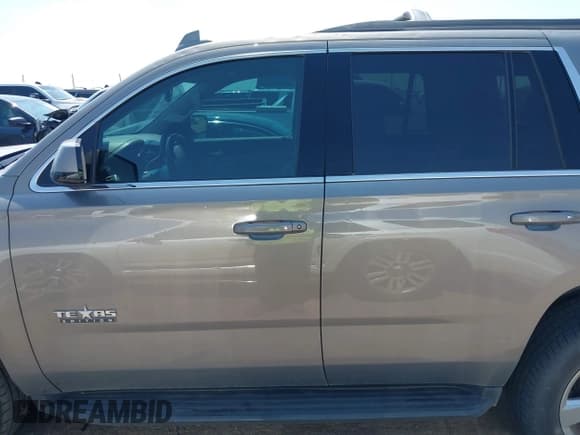 ✅ 2019 Chevrolet Tahoe LT • VIN: 1GNSKBKC6KR165031 • Lot: 42693802. Listed on IAAI with 119,883 mi. Free auction sales archive from the USA and detailed vehicle history report at DreamBid. Image 14.