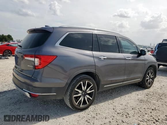 ✅ 2019 Honda Pilot Touring 7-Passenger • VIN: 5FNYF5H66KB028607 • Lot: 63397105. Listed on Copart with 67,627 mi. Free auction sales archive from the USA and detailed vehicle history report at DreamBid. Image 3.