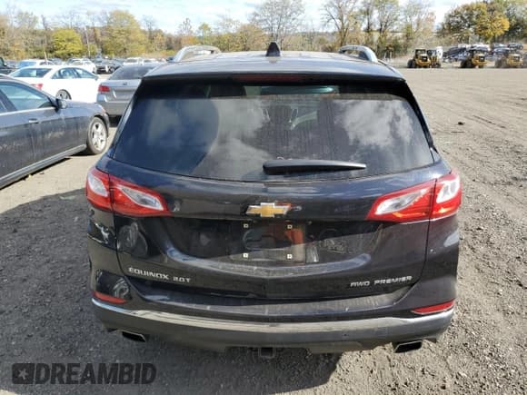 ✅ 2020 Chevrolet Equinox Premier • VIN: 2GNAXYEX9L6200110 • Лот: 90265495. Опубликован ранее на Copart с пробегом 28 855 миль. Бесплатный доступ к архиву аукционных продаж из США и подробный отчёт об истории автомобиля на DreamBid. Изображение 6.