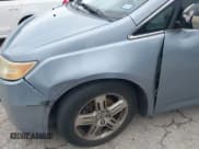 ✅ 2012 Honda Odyssey Touring • VIN: 5FNRL5H90CB130607 • Лот: 43670562. Опубликован ранее на IAAI с пробегом 216 426 миль. Бесплатный доступ к архиву аукционных продаж из США и подробный отчёт об истории автомобиля на DreamBid. Изображение 6.