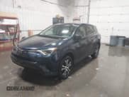 ✅ 2018 Toyota RAV4 LE • VIN: 2T3BFREV6JW767297 • Lot: 43736278. Listed on IAAI with 99,323 mi. Free auction sales archive from the USA and detailed vehicle history report at DreamBid. Image 2.