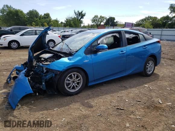 2021 Toyota Prius L Eco with VIN JTDKAMFU1M3142045, listed as a Copart auction lot 71478995 with Not provided miles and Salvage title. Bid and sale history available at DreamBid. Image 1.