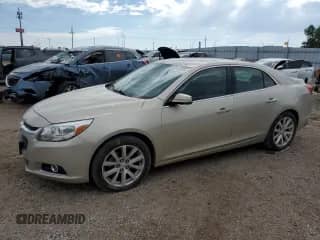 2016 Chevrolet Malibu LTZ with VIN 1G11E5SA6GF133211, listed as a Copart auction lot 80162055 with 116,742 mi miles and Salvage title. Bid and sale history available at DreamBid. Image 1.