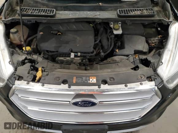 2018 Ford Escape SE z VIN 1FMCU9GD5JUA85387, wystawiony jako Copart lot #91200335 z przebiegiem 142 271 mil mil oraz Szkoda całkowita • Salvage title. Historia ofert i sprzedaży dostępna na DreamBid. Obrazek 12.