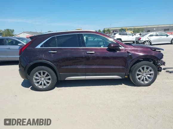 ✅ 2020 Cadillac XT4 AWD Premium Luxury • VIN: 1GYFZDR41LF111066 • Lot: 43119718. Listed on IAAI with 34,893 mi. Free auction sales archive from the USA and detailed vehicle history report at DreamBid. Image 14.