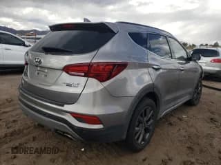 ✅ 2018 Hyundai Santa Fe Ultimate • VIN: 5NMZWDLA3JH103285 • Лот: 61269632. Опубликован ранее на Copart с пробегом Не указан. Бесплатный доступ к архиву аукционных продаж из США и подробный отчёт об истории автомобиля на DreamBid. Изображение 4.