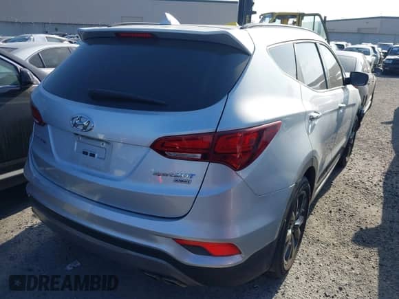 2017 Hyundai Santa Fe Ultimate with VIN 5XYZW4LAXHG412627, listed as a IAAI auction lot 43464775 with 86,112 mi miles and . Bid and sale history available at DreamBid. Image 4.