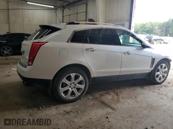 ✅ 2016 Cadillac SRX Premium Collection • VIN: 3GYFNDE34GS552894 • Lot: 64945985. Listed on Copart with 105,751 mi. Free auction sales archive from the USA and detailed vehicle history report at DreamBid. Image 3.