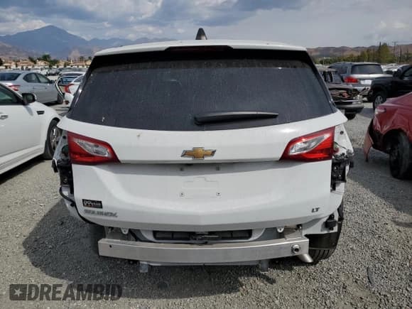 ✅ 2021 Chevrolet Equinox LT • VIN: 2GNAXJEV7M6134874 • Lot: 80825595. Listed on Copart with 32,984 mi. Free auction sales archive from the USA and detailed vehicle history report at DreamBid. Image 6.
