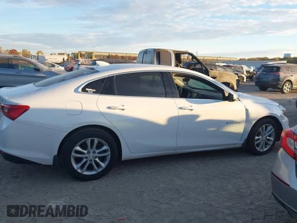 ✅ 2017 Chevrolet Malibu LT • VIN: 1G1ZE5STXHF192929 • Lot: 43468126. Listed on IAAI with 121,210 mi. Free auction sales archive from the USA and detailed vehicle history report at DreamBid. Image 13.