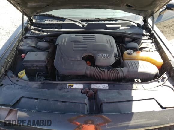 ✅ 2013 Dodge Challenger SXT • VIN: 2C3CDYAG1DH691640 • Lot: 77842744. Wystawiony na Copart z przebiegiem 181 343 mil. Bezpłatny archiwum sprzedaży aukcyjnych z USA i szczegółowy raport historii pojazdu na DreamBid. Zdjęcie 12.