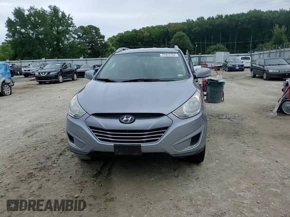2011 Hyundai Tucson GLS z VIN KM8JU3AC1BU275337, wystawiony jako Copart lot #72953794 z przebiegiem 255 917 mil mil oraz Szkoda całkowita • Salvage title. Historia ofert i sprzedaży dostępna na DreamBid. Obrazek 11.