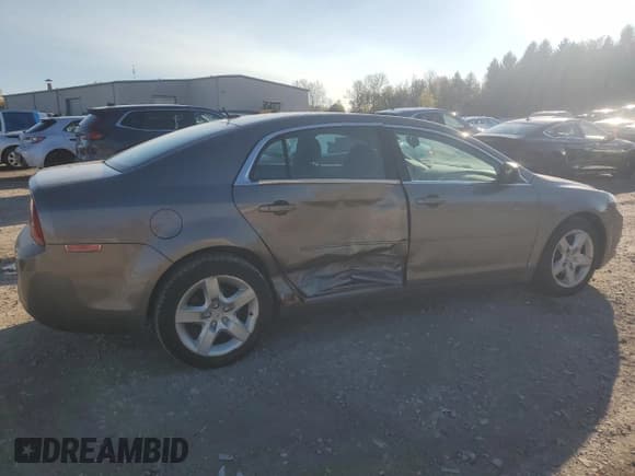 ✅ 2011 Chevrolet Malibu 1LS • VIN: 1G1ZB5E18BF111890 • Lot: 75464594. Listed on Copart with 92,063 mi. Free auction sales archive from the USA and detailed vehicle history report at DreamBid. Image 3.