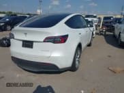 ✅ 2023 Tesla Model Y Long Range • VIN: 7SAYGDEE5PA168223 • Lot: 43341688. Listed on IAAI with 59,137 mi. Free auction sales archive from the USA and detailed vehicle history report at DreamBid. Image 4.