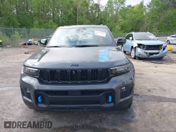 2022 Jeep Grand Cherokee Trailhawk with VIN 1C4RJYC69N8756423, listed as a IAAI auction lot 41947812 with 9,770 mi miles and . Bid and sale history available at DreamBid. Image 12.