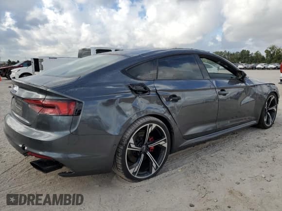 ✅ 2019 Audi RS 5 Sportback • VIN: WUABWCF55KA906835 • Лот: 85359985. Опубликован ранее на Copart с пробегом 52 543 миль. Бесплатный доступ к архиву аукционных продаж из США и подробный отчёт об истории автомобиля на DreamBid. Изображение 3.