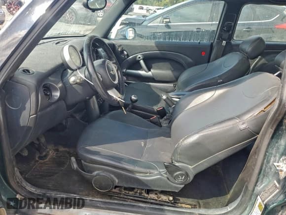 ✅ 2006 MINI Hardtop • VIN: WMWRC33516TK73878 • Lot: 92715115. Listed on Copart with 272,663 mi. Free auction sales archive from the USA and detailed vehicle history report at DreamBid. Image 7.