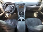 ✅ 2013 Ford Fusion Titanium Hybrid • VIN: 3FA6P0RU3DR291973 • Лот: 82748155. Опубликован ранее на Copart с пробегом Не указан. Бесплатный доступ к архиву аукционных продаж из США и подробный отчёт об истории автомобиля на DreamBid. Изображение 8.