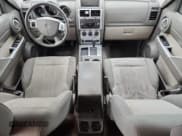 ✅ 2007 Dodge Nitro SLT • VIN: 1D8GT58K57W718953 • Lot: 90119395. Wystawiony na Copart z przebiegiem 163 241 mil. Bezpłatny archiwum sprzedaży aukcyjnych z USA i szczegółowy raport historii pojazdu na DreamBid. Zdjęcie 8.