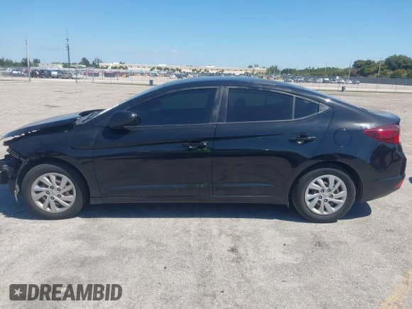 ✅ 2019 Hyundai Elantra SE • VIN: KMHD74LF4KU839046 • Lot: 42032995. Listed on IAAI with 72,590 mi. Free auction sales archive from the USA and detailed vehicle history report at DreamBid. Image 15.