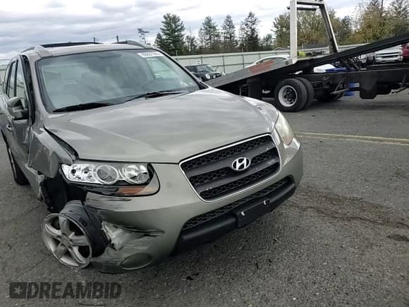 ✅ 2007 Hyundai Santa Fe GLS • VIN: 5NMSG73D27H104947 • Lot: 90691985. Listed on Copart with 89,054 mi. Free auction sales archive from the USA and detailed vehicle history report at DreamBid. Image 14.