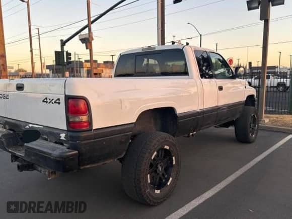 2001 Dodge 1500 with VIN 3B7HF13Z31M517146, listed as a Copart auction lot 78106704 with 145,031 mi miles and Clean title. Bid and sale history available at DreamBid. Image 4.