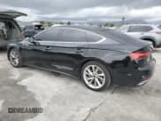 ✅ 2023 Audi A5 Sportback Premium • VIN: WAUABCF50PA026120 • Lot: 48141855. Listed on Copart with 38,272 mi. Free auction sales archive from the USA and detailed vehicle history report at DreamBid. Image 2.