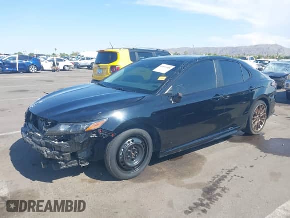 2023 Toyota Camry SE with VIN 4T1G11BK2PU105668, listed as a IAAI auction lot 43013320 with 39,694 mi miles and . Bid and sale history available at DreamBid. Image 18.