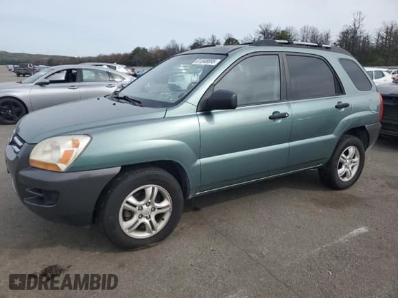 ✅ 2006 Kia Sportage LX • VIN: KNDJF723667182905 • Лот: 81348695. Опубликован ранее на Copart с пробегом 83 805 миль. Бесплатный доступ к архиву аукционных продаж из США и подробный отчёт об истории автомобиля на DreamBid. Изображение 1.