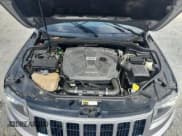 ✅ 2015 Jeep Grand Cherokee Limited • VIN: 1C4RJFBM2FC937088 • Lot: 80723215. Listed on Copart with 119,037 mi. Free auction sales archive from the USA and detailed vehicle history report at DreamBid. Image 12.