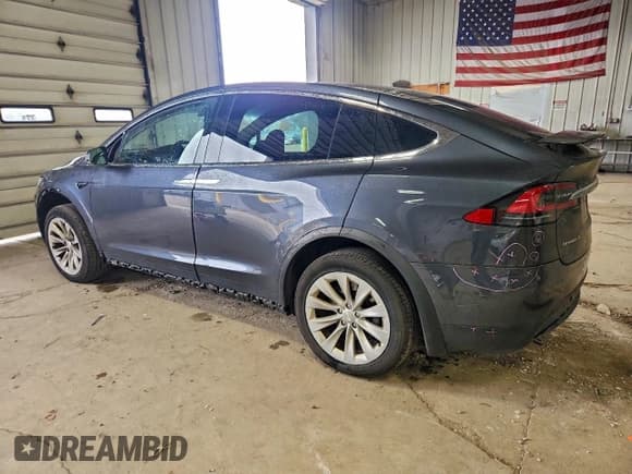 ✅ 2016 Tesla Model X 70D • VIN: 5YJXCBE2XGF019176 • Lot: 94191885. Listed on Copart with 234,701 mi. Free auction sales archive from the USA and detailed vehicle history report at DreamBid. Image 2.