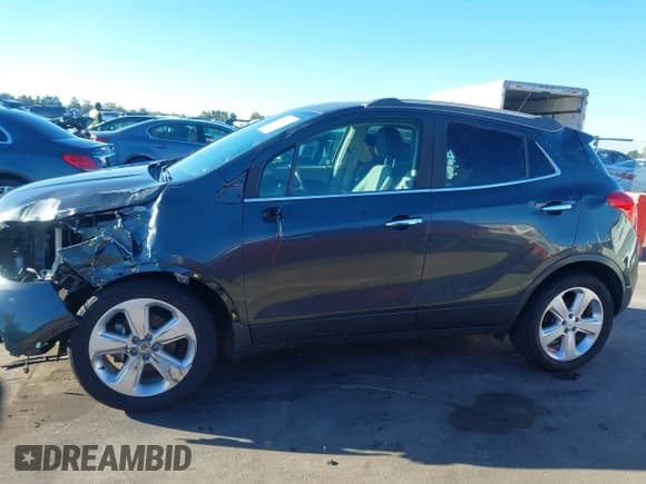 ✅ 2016 Buick Encore Convenience • VIN: KL4CJBSB8GB745592 • Лот: 43468567. Опубликован ранее на IAAI с пробегом 129 804 миль. Бесплатный доступ к архиву аукционных продаж из США и подробный отчёт об истории автомобиля на DreamBid. Изображение 15.