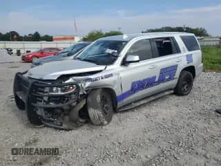 2020 Chevrolet Tahoe Commercial z VIN 1GNLCDECXLR230490, wystawiony jako Copart lot #69777505 z przebiegiem 90 213 mil mil oraz Szkoda całkowita • Salvage title. Historia ofert i sprzedaży dostępna na DreamBid. Obrazek 1.