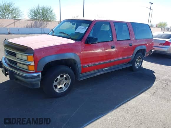 1994 Chevrolet Suburban z VIN 1GNFK16K9RJ334433, wystawiony jako IAAI lot #43559913 z przebiegiem 322 899 mil mil oraz . Historia ofert i sprzedaży dostępna na DreamBid. Obrazek 2.