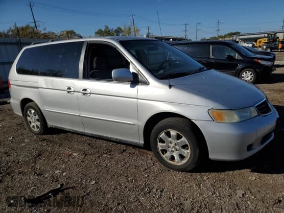 ✅ 2004 Honda Odyssey EX • VIN: 5FNRL18694B051047 • Lot: 82435535. Wystawiony na Copart z przebiegiem 238 002 mil. Bezpłatny archiwum sprzedaży aukcyjnych z USA i szczegółowy raport historii pojazdu na DreamBid. Zdjęcie 4.