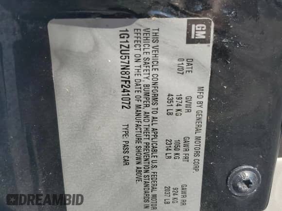 2007 Chevrolet Malibu LTZ z VIN 1G1ZU57N87F241072, wystawiony jako Copart lot #73156324 z przebiegiem 108 611 mil mil oraz Szkoda całkowita • Salvage title. Historia ofert i sprzedaży dostępna na DreamBid. Obrazek 13.