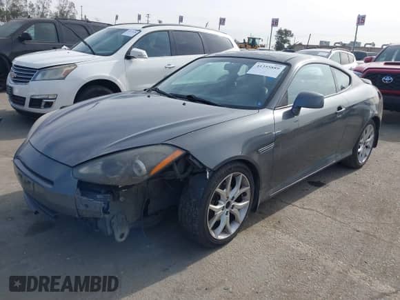 2007 Hyundai Tiburon GT с VIN KMHHN66F37U251290, выставлен на аукционе IAAI как лот 41355889 с пробегом 135 374 миль миль и . История ставок и продаж доступна на DreamBid. Изображение 2.